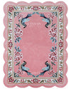 Pink rug with floral and bird designs, featuring the brand 'Craftsman Rugs'.